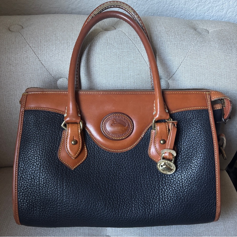 Dooney & Bourke vintage All Weather Leather Black and Tan Satchel bag